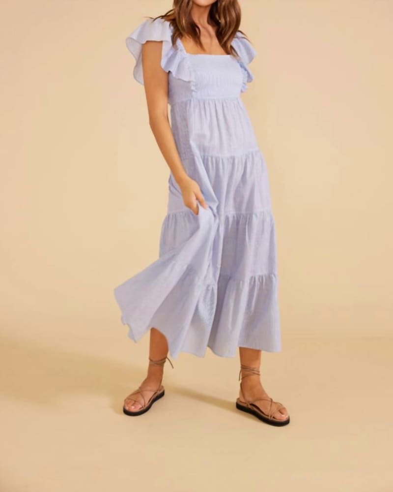 Front of a model wearing a size Large Aries Tiered Midi Dress In Blue/White in Blue/White by MINKPINK. | dia_product_style_image_id:351486